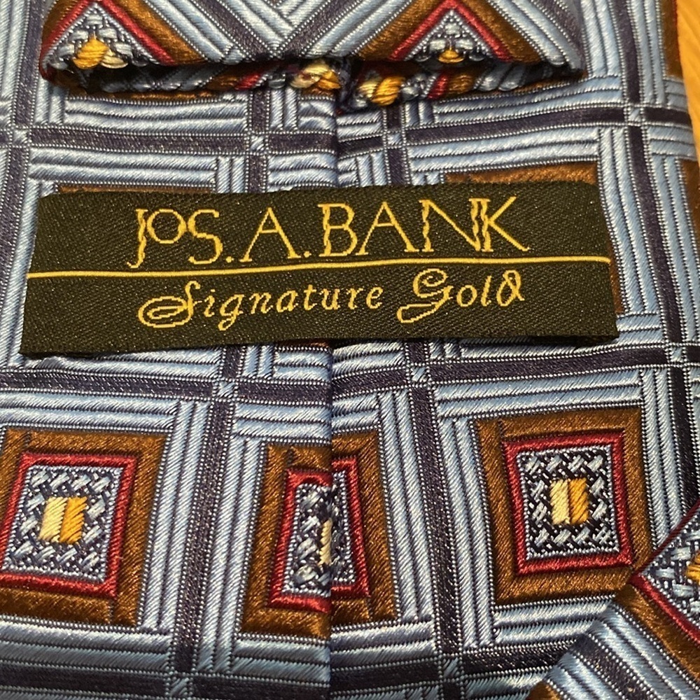 Jos A Bank Signature Gold Silk Geometric Brocade Hand Made Tie Blue Gold Red